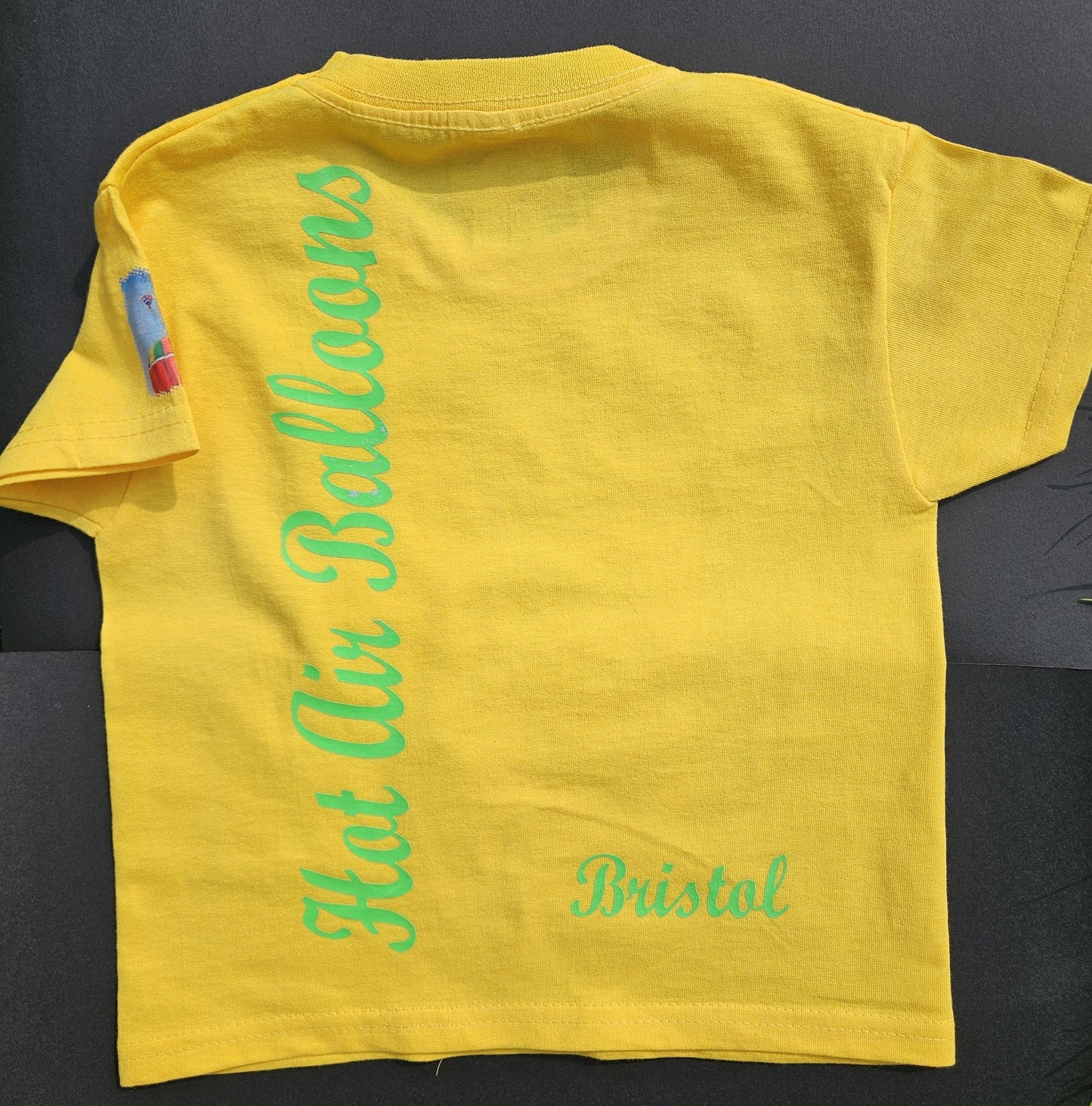 Sunflower Yellow. T-Shirts with Hot Air Balloons in Bristol Graphics for Toddlers, and Youth. Sunflower colour.