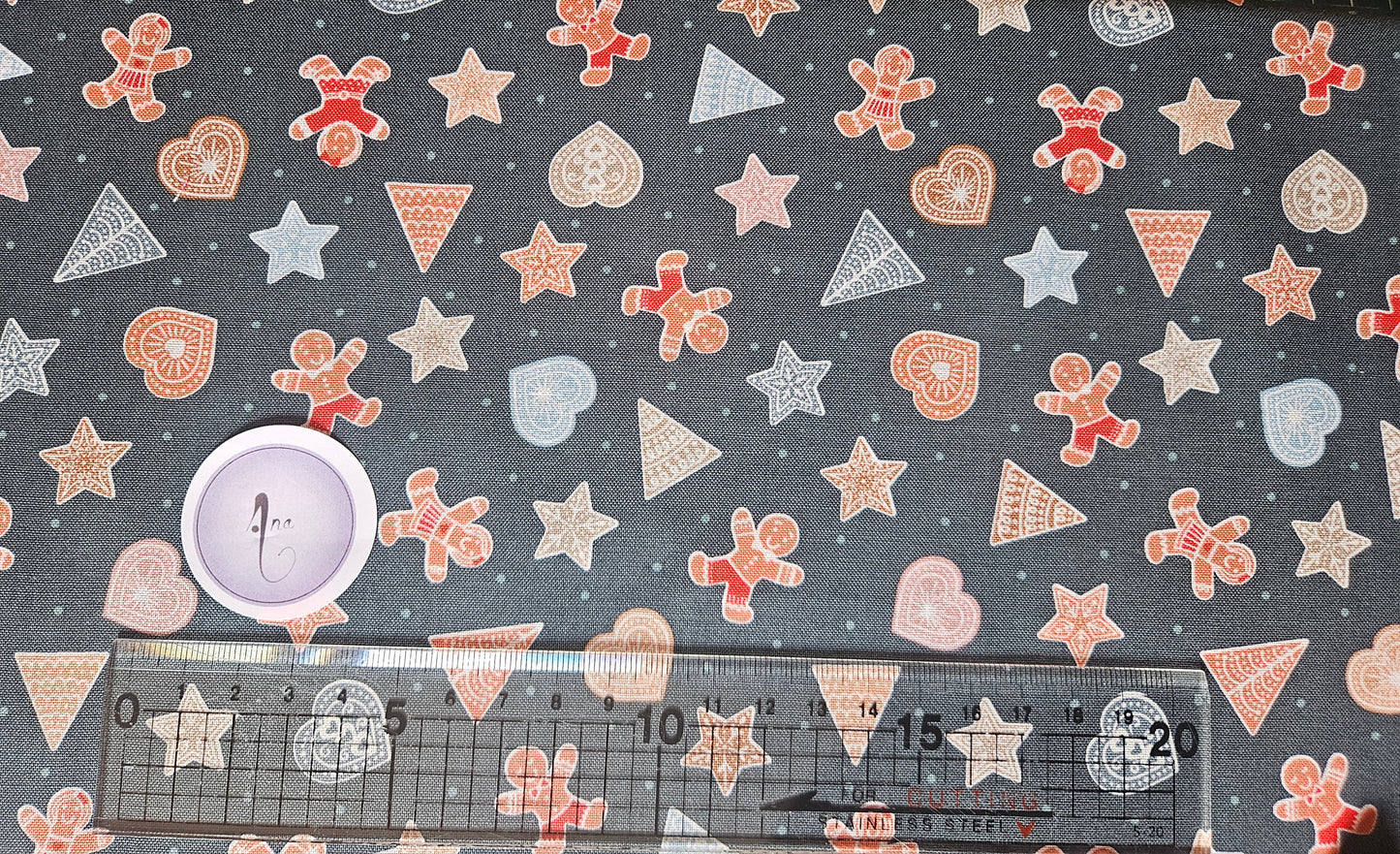 Gingerbread Shapes on Dark - Christmas Fabrics collection by Lewis & Irene