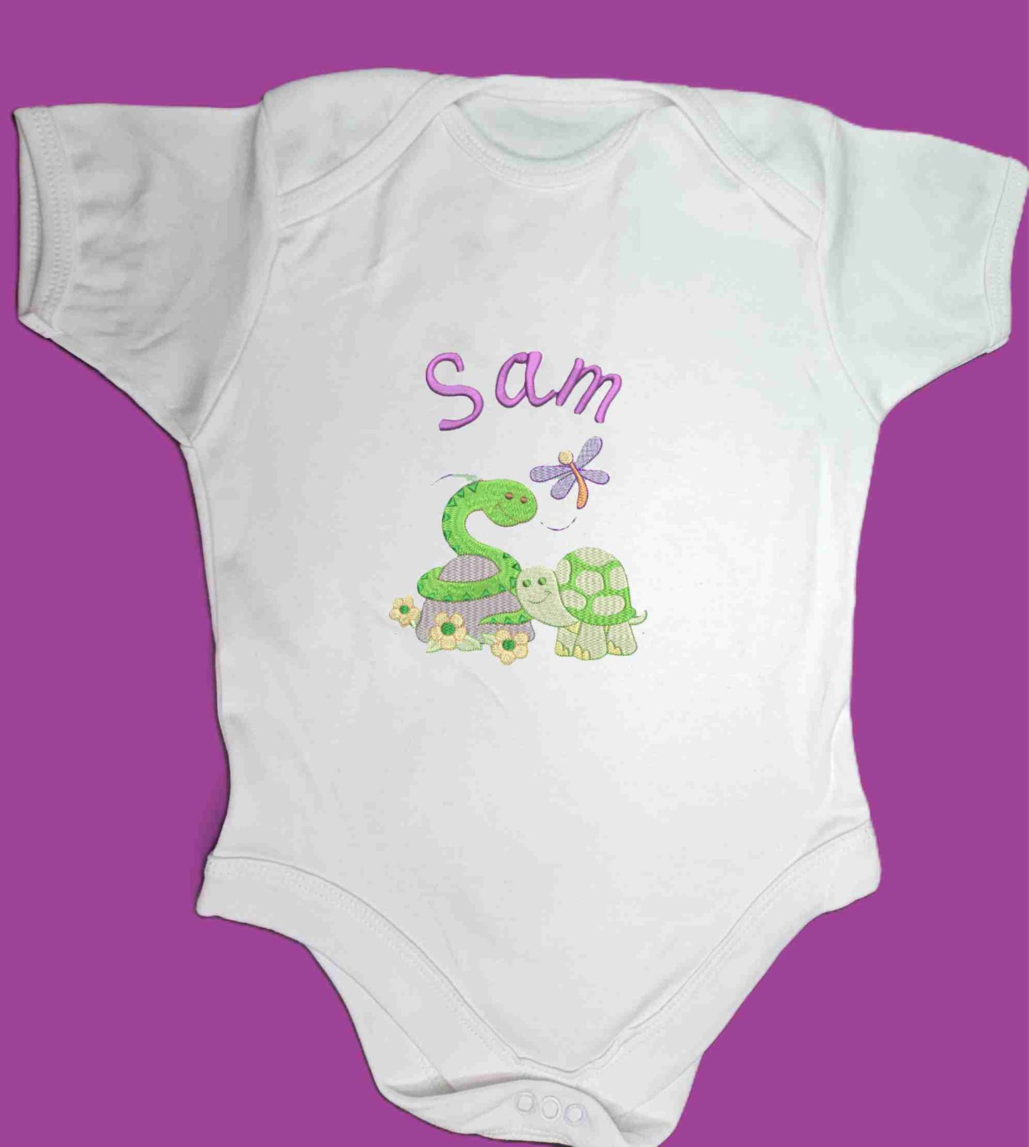 Personalised Baby Snake and Baby Turtle enjoying the spring with their little Dragonfly friend. Design Embroidered on Organic Cotton Long and Short Sleeve Baby Bodysuit. Comfortable and soft.