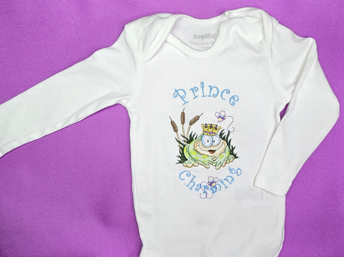 Prince Charming Froggy. Cute Design Embroidered on Organic Cotton Long and Short Sleeve Baby Bodysuit. Comfortable and soft.