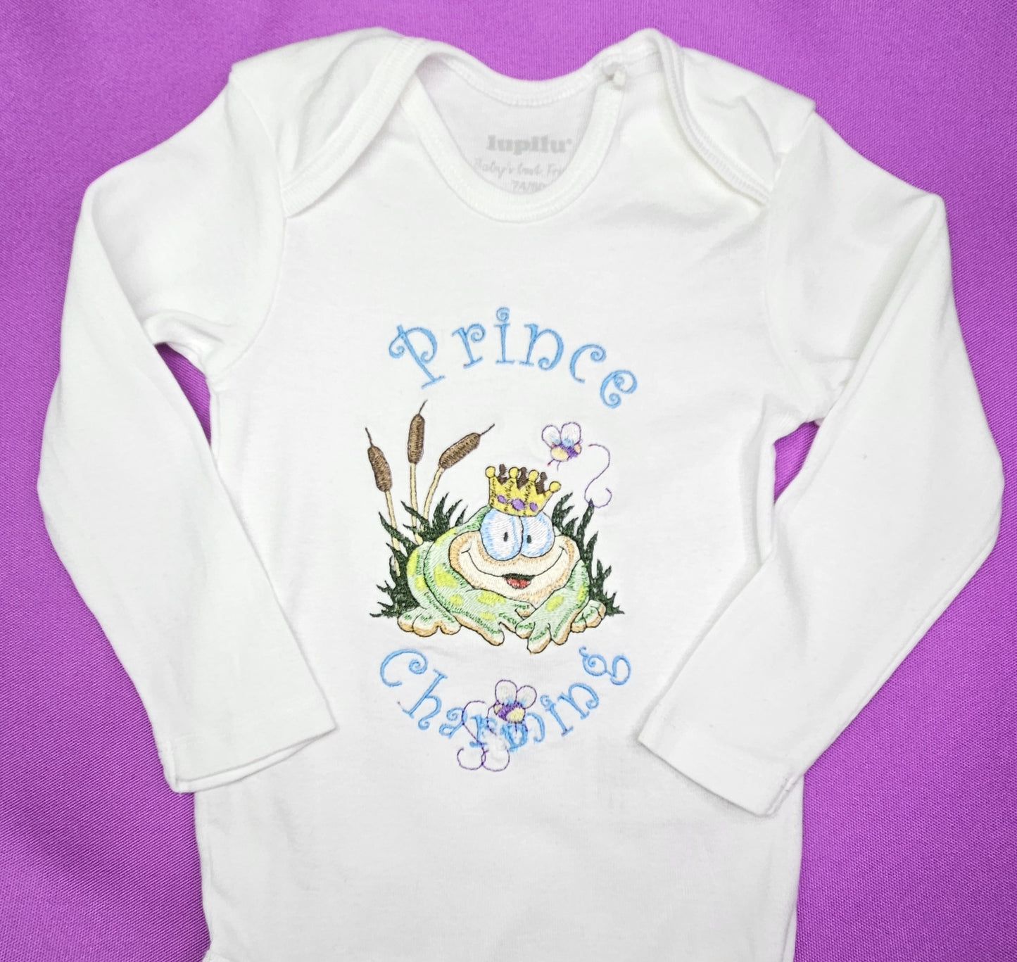 Prince Charming Froggy. Cute Design Embroidered on Organic Cotton Long and Short Sleeve Baby Bodysuit. Comfortable and soft.
