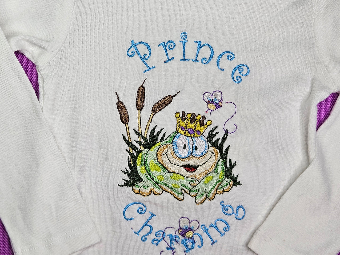 Prince Charming Froggy. Cute Design Embroidered on Organic Cotton Long and Short Sleeve Baby Bodysuit. Comfortable and soft.