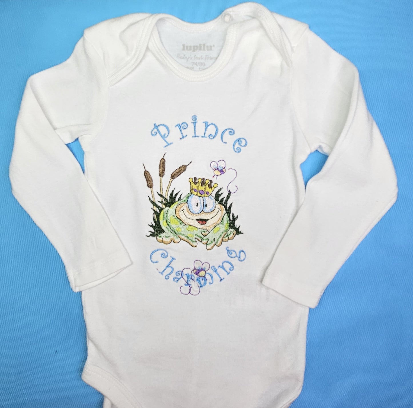 Prince Charming Froggy. Cute Design Embroidered on Organic Cotton Long and Short Sleeve Baby Bodysuit. Comfortable and soft.