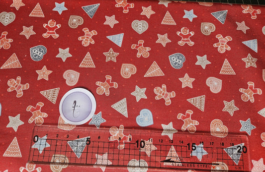 Gingerbread Shapes on Red - Christmas Fabrics collection by Lewis & Irene