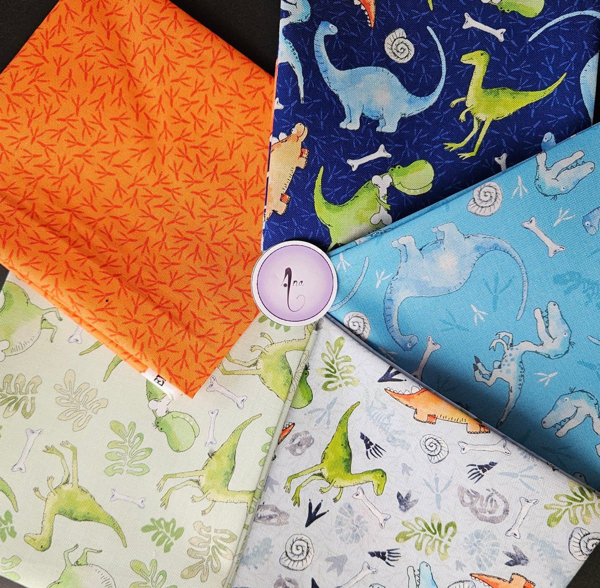 Little Dinosaurs fabric collection designed by Susan Wheeler
