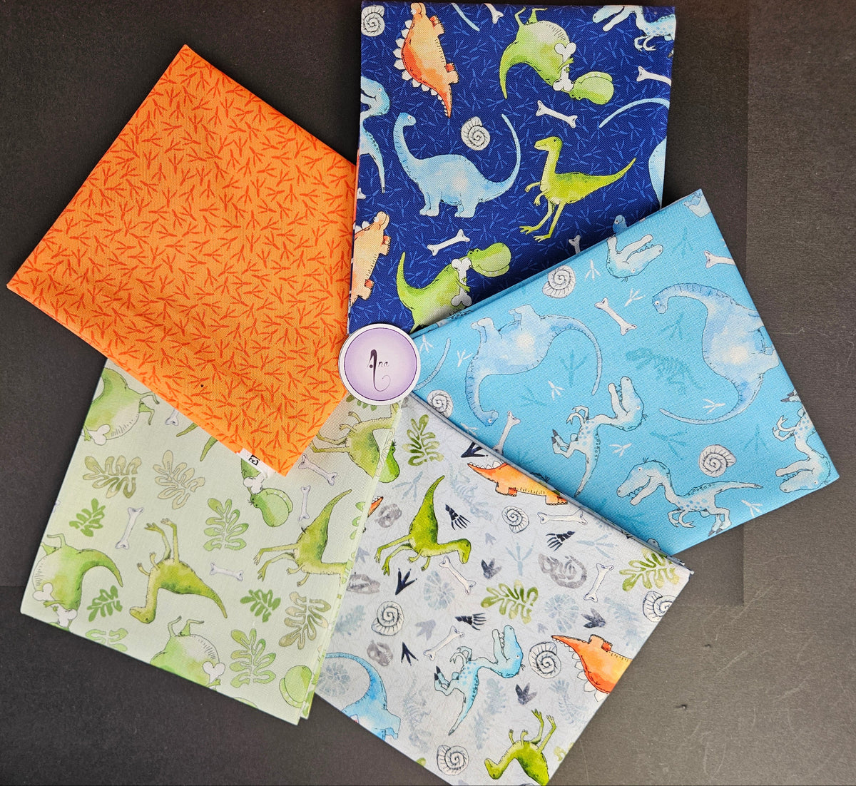 Little Dinosaurs fabric collection designed by Susan Wheeler