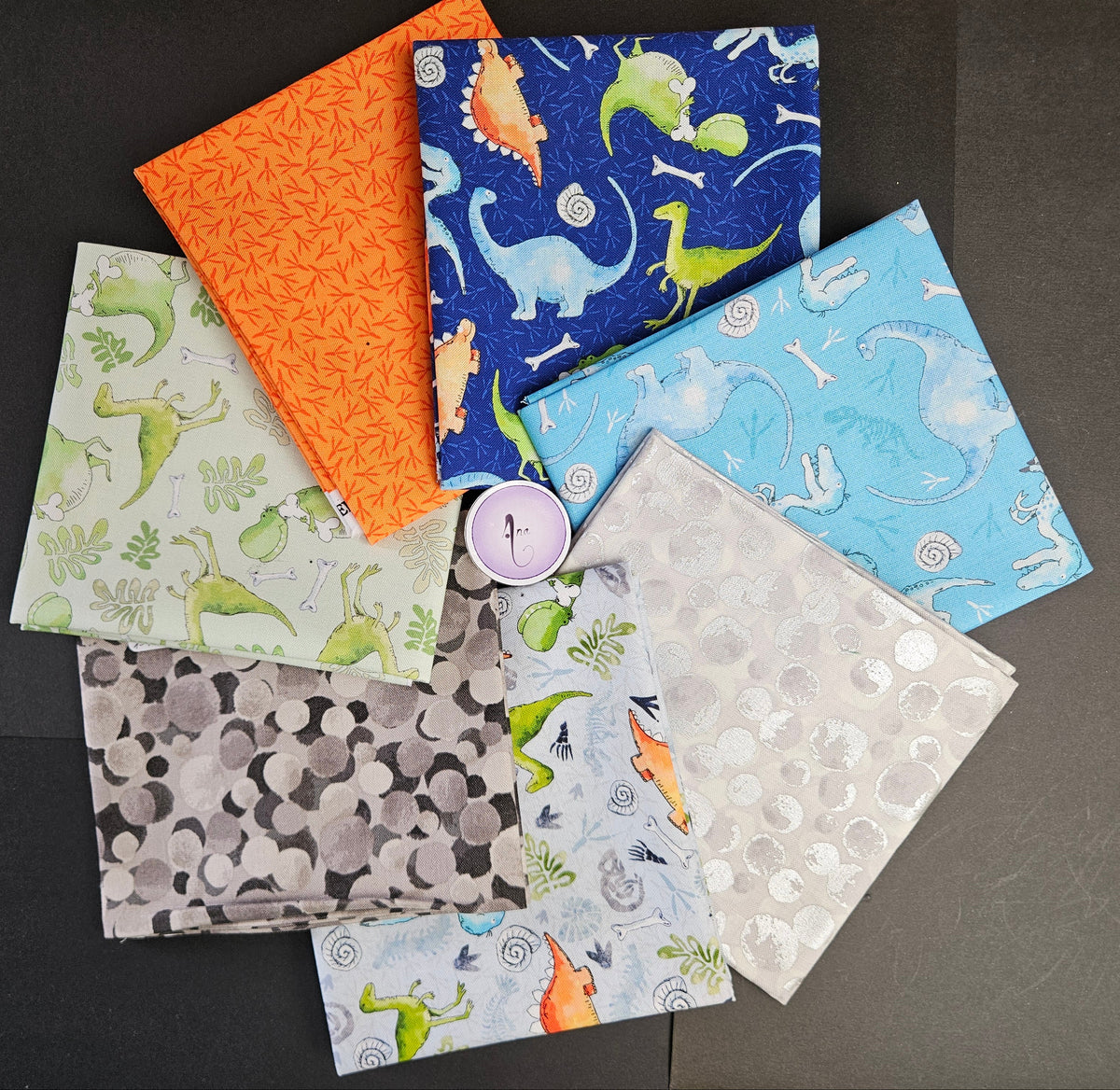 Little Dinosaurs fabric collection designed by Susan Wheeler