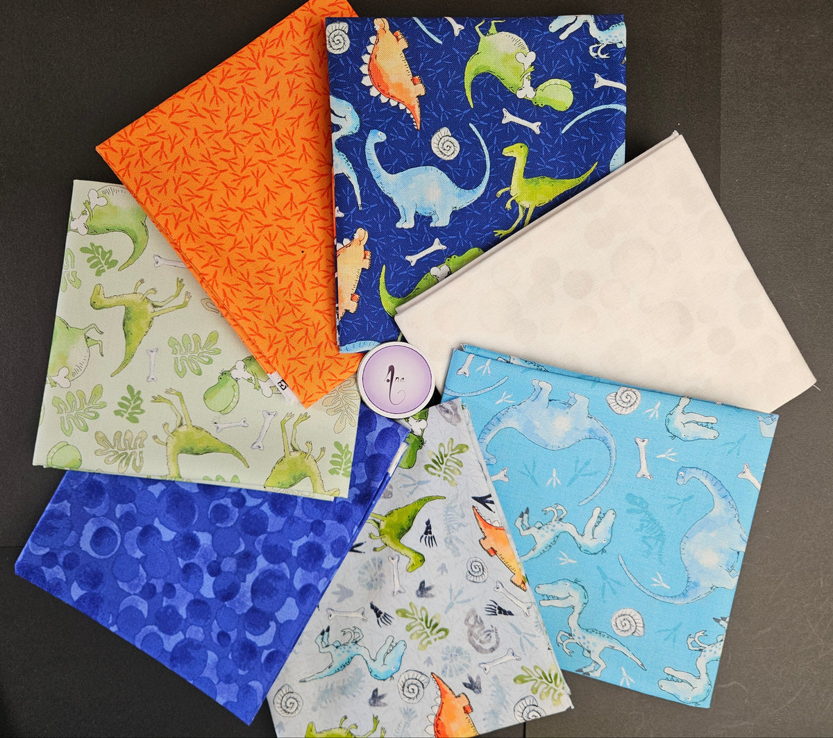Little Dinosaurs fabric collection designed by Susan Wheeler