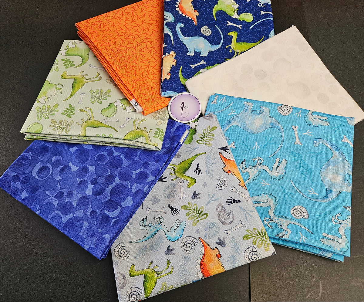 Little Dinosaurs fabric collection designed by Susan Wheeler