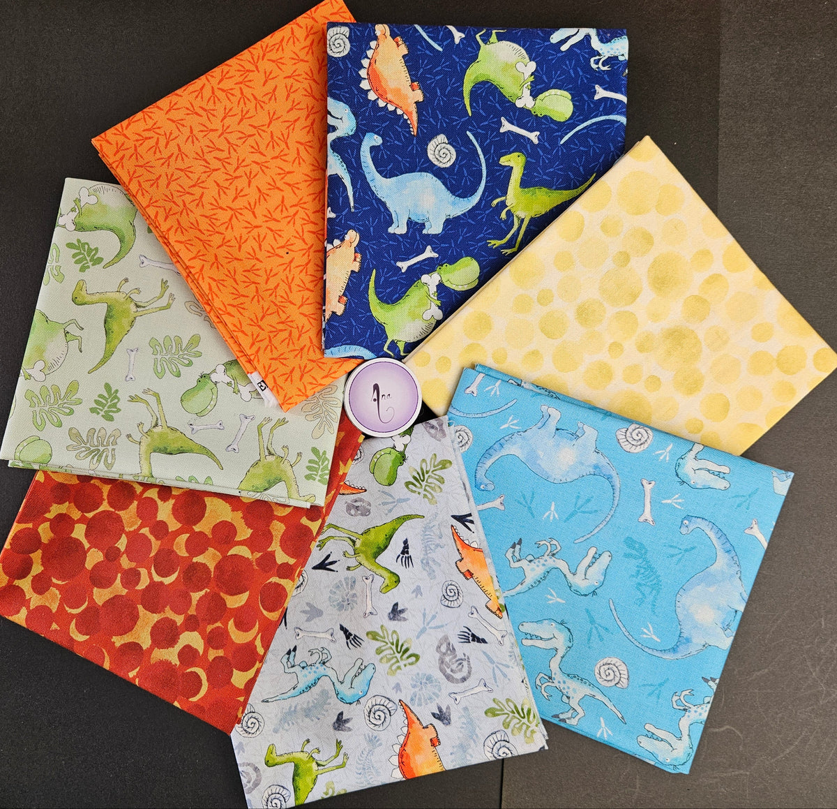 Little Dinosaurs fabric collection designed by Susan Wheeler