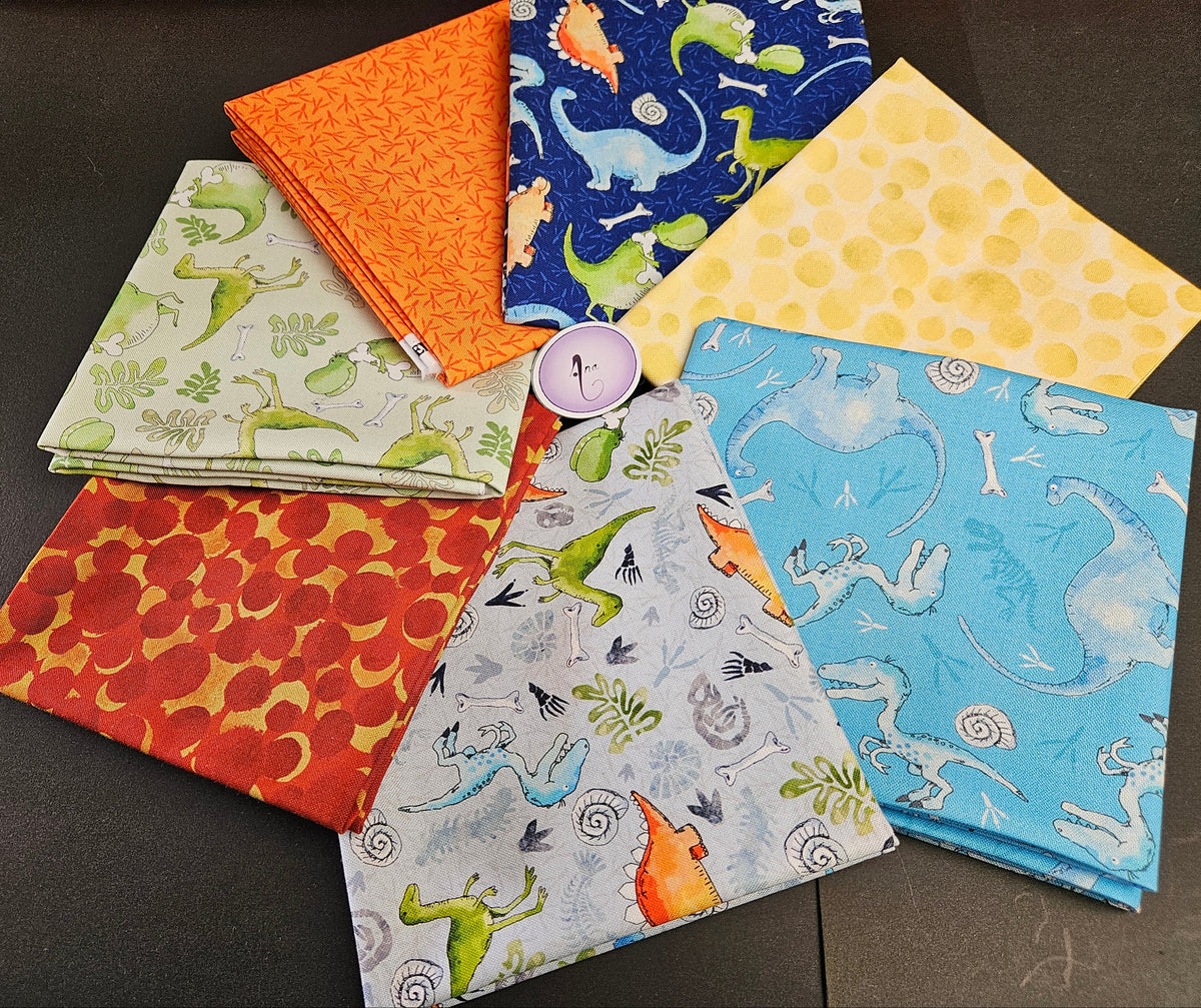 Little Dinosaurs fabric collection designed by Susan Wheeler