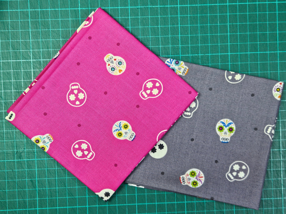 Sugar Skulls on Bright Pink and Grey. Glows in the dark. Fabrics by Lewis & Irene