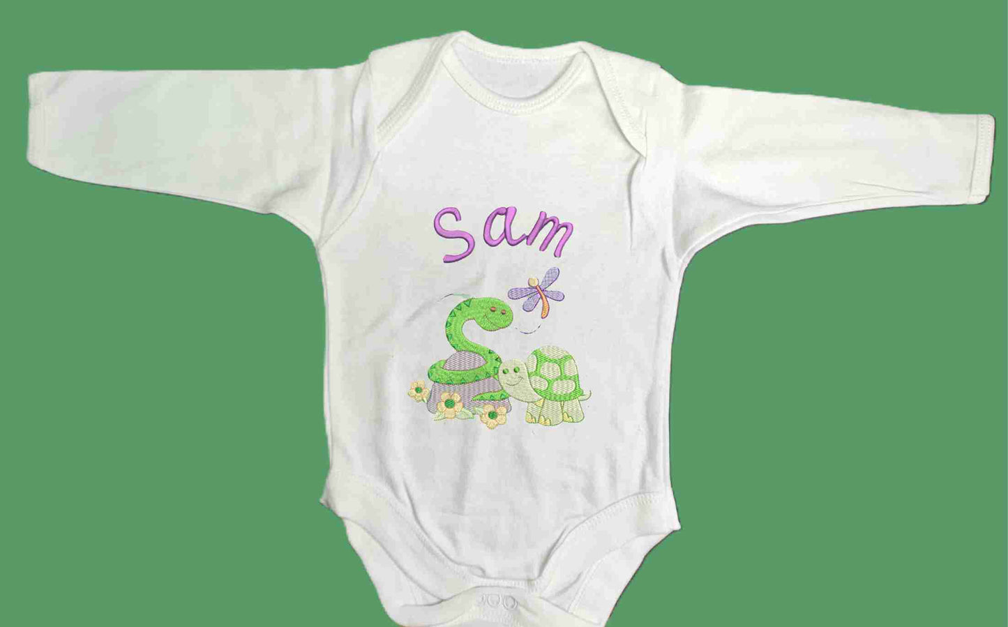 Personalised Baby Snake and Baby Turtle enjoying the spring with their little Dragonfly friend.  Design Embroidered on Organic Cotton Long and Short Sleeve Baby Bodysuit. Comfortable and soft.