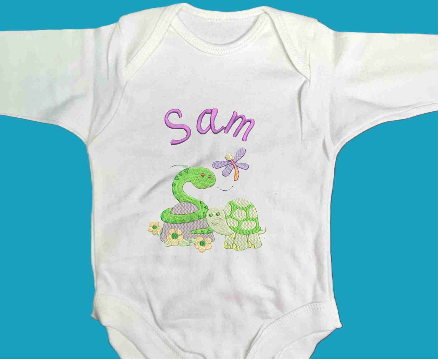 Personalised Baby Snake and Baby Turtle enjoying the spring with their little Dragonfly friend.  Design Embroidered on Organic Cotton Long and Short Sleeve Baby Bodysuit. Comfortable and soft.